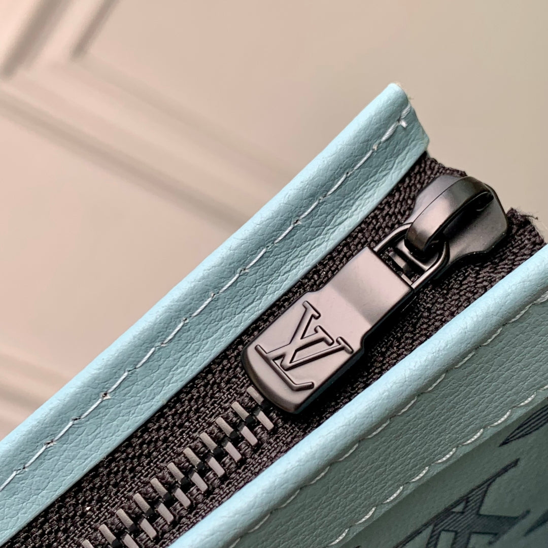 GASTON WEARABLE WALLET 22 IN SKY BLUE MONOGRAM SHADOW CALFSKIN EMBOSSED LOGO