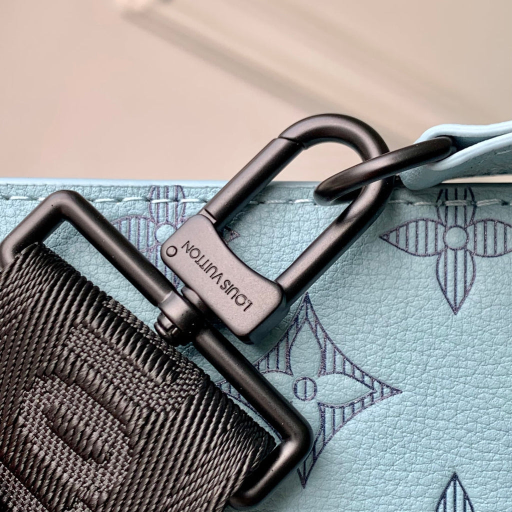 GASTON WEARABLE WALLET 22 IN SKY BLUE MONOGRAM SHADOW CALFSKIN EMBOSSED LOGO