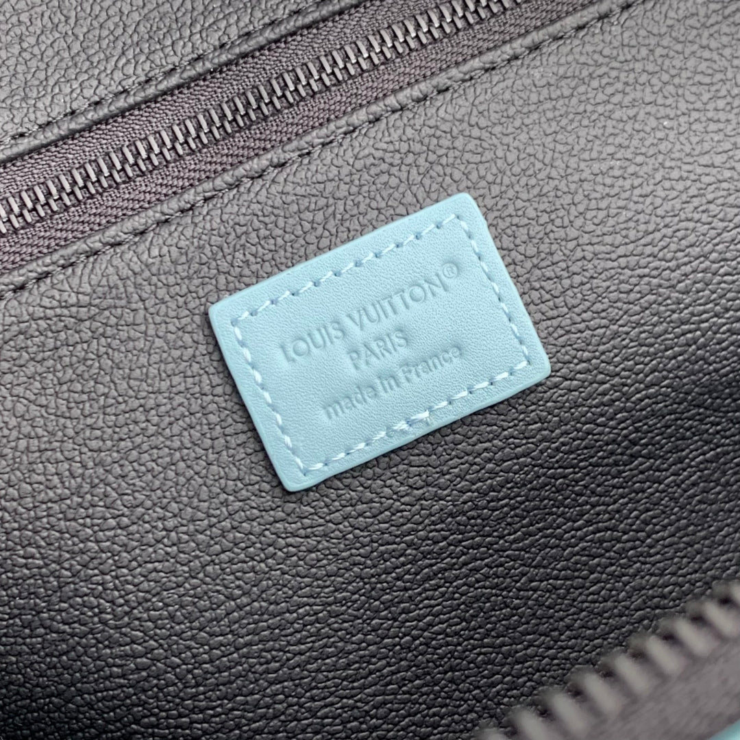 DOPP KIT 28 IN SKY BLUE MONOGRAM SHADOW CALFSKIN EMBOSSED LOGO