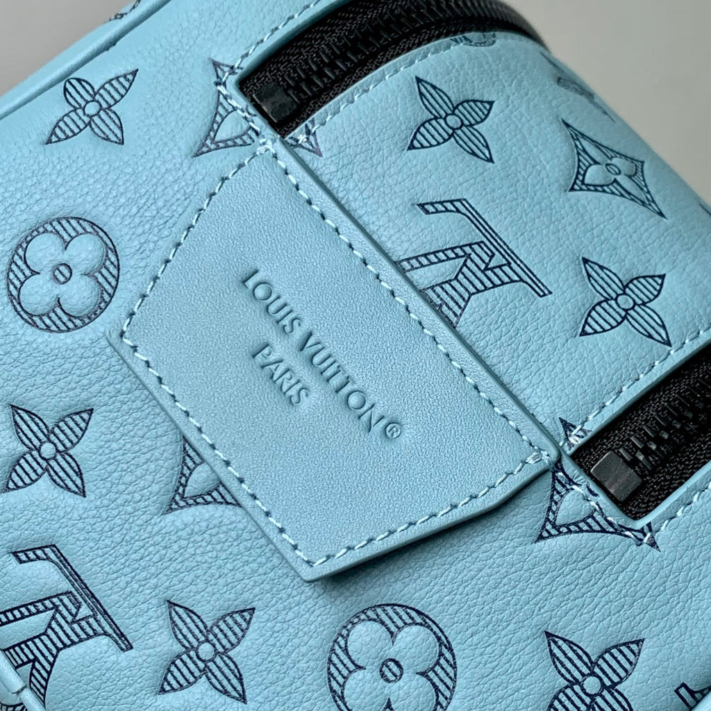 DOPP KIT 28 IN SKY BLUE MONOGRAM SHADOW CALFSKIN EMBOSSED LOGO