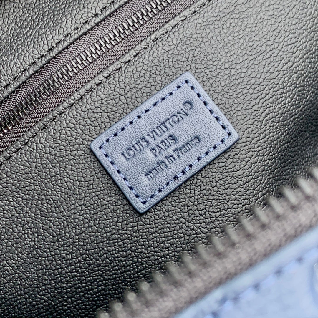 DOPP KIT 28 IN DARK BLUE MONOGRAM SHADOW CALFSKIN