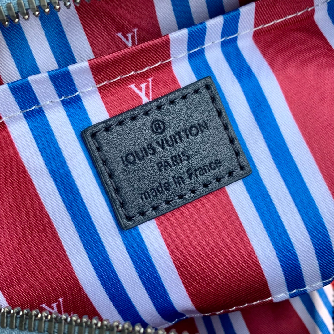 KEEPALL BANDOULIÈRE 25 INSKY BLUE MONOGRAM HERITAGE CANVAS DARK BLUE CALFSKIN