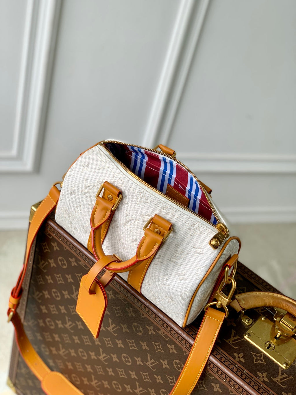 KEEPALL BANDOULIÈRE 25 IN WHITE MONOGRAM HERITAGE CANVAS BRWON CALFSKIN