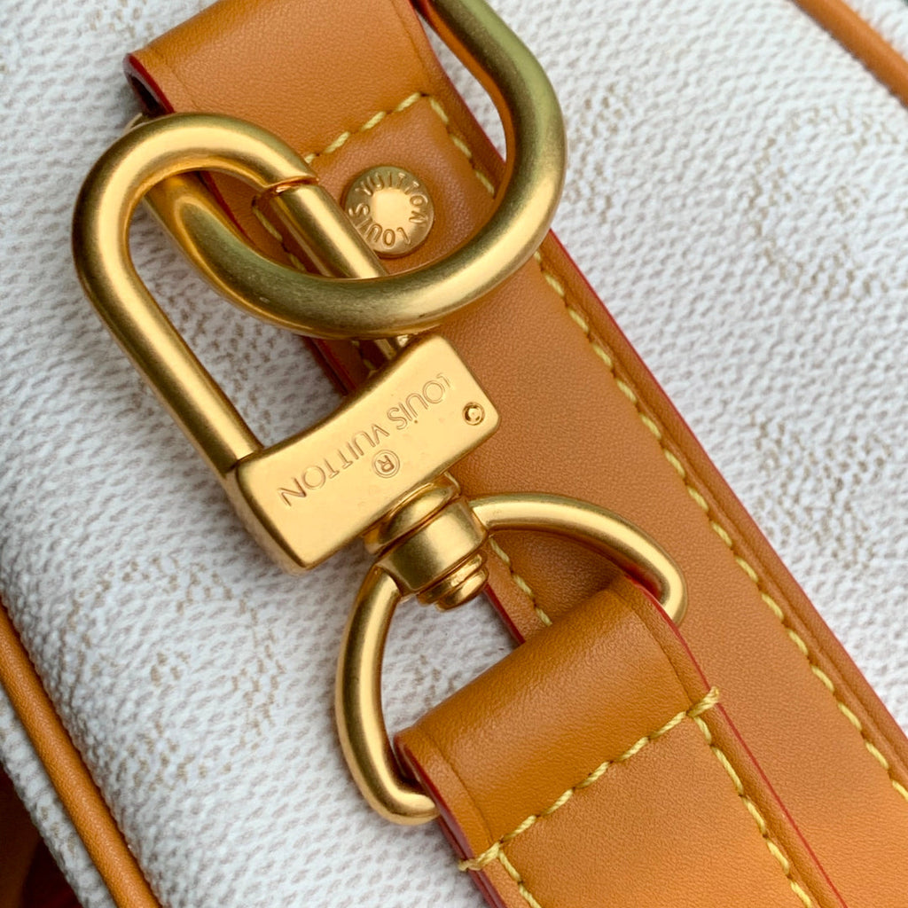 KEEPALL BANDOULIÈRE 25 IN WHITE MONOGRAM HERITAGE CANVAS BRWON CALFSKIN