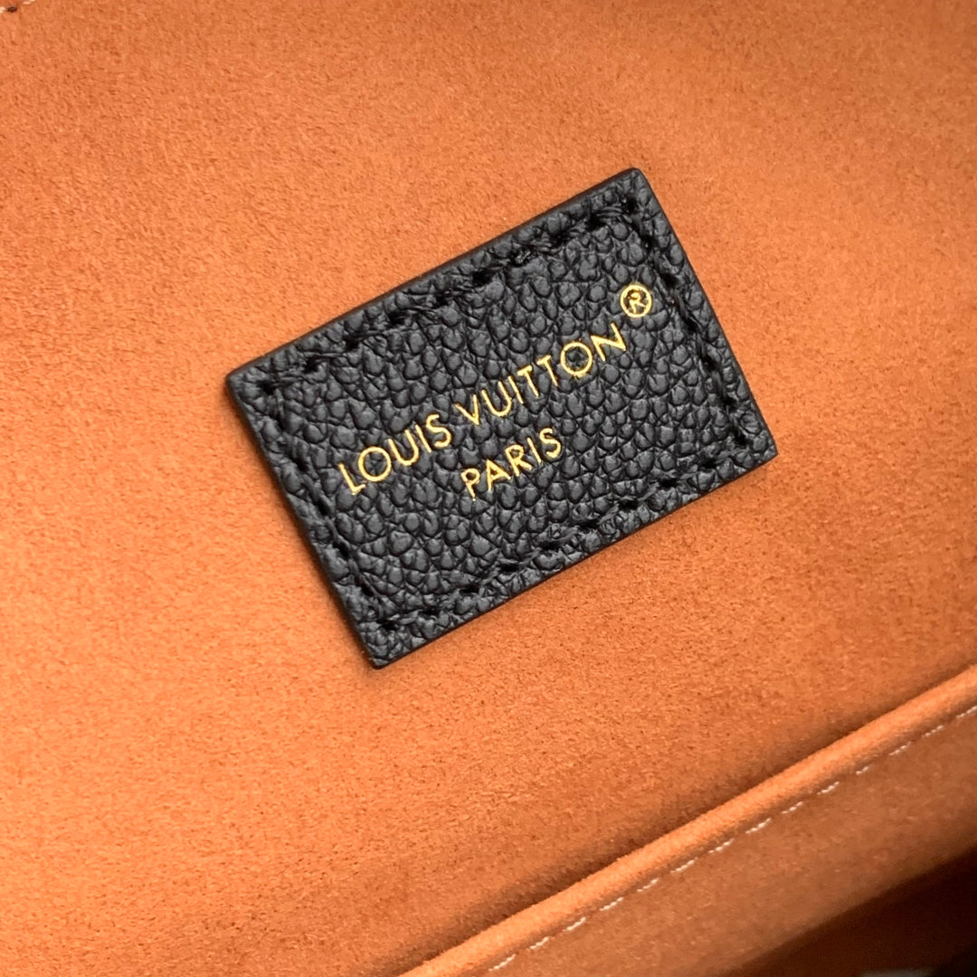 LOW KEY COOKIE MM 32 IN BLACK CALFSKIN BROWN MONOGRAM TAG