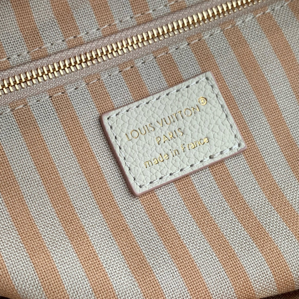 ONTHEGO 25 IN CREAM MONOGRAM EMPREINTE CALFSKIN EMBOSSED LOGO