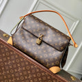 HIDE AWAY MM 36 IN BROWN MONOGRAM COATED CANVAS AND CALFSKIN