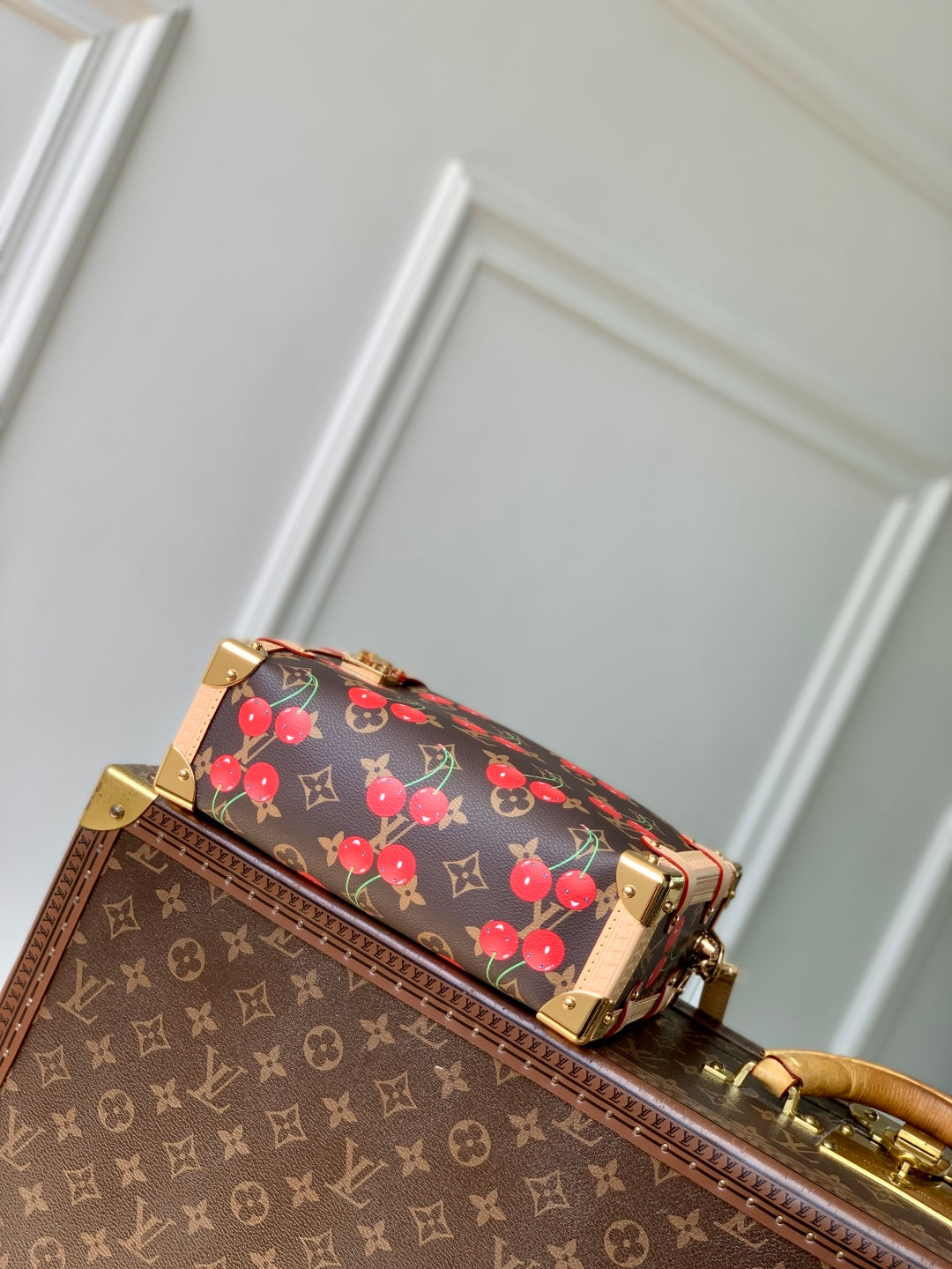 SIDE TRUNK MM LV x TM IN BROWN MONOGRAM CANVAS CHERRY PRINTED