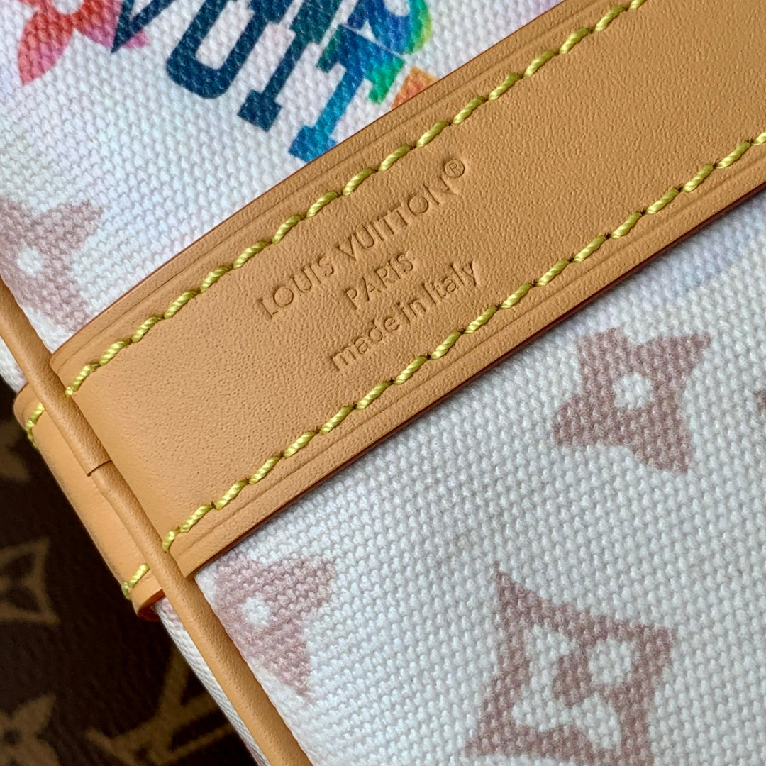 KEEPALL BANDOULIÈRE 45 IN WHITE MONOGRAM DUNE CANVAS AND CALFSKIN