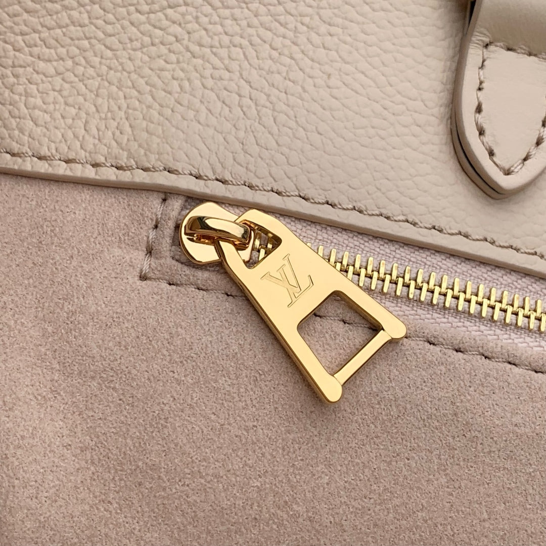 ONTHEGO MM 35 IN  BLUSH PINK MONOGRAM CALFSKIN