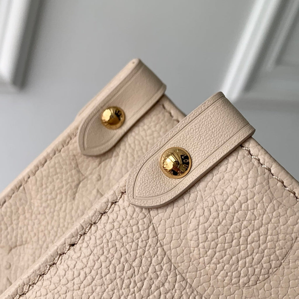 ONTHEGO MM 35 IN  BLUSH PINK MONOGRAM CALFSKIN