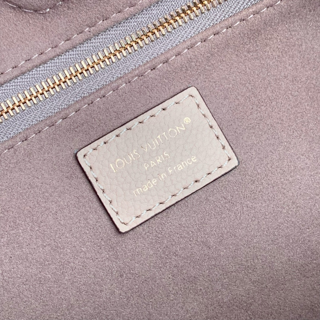 ANYTIME MM 42 IN NUDE PINK MONOGRAM EMPREINTE CALFSKIN