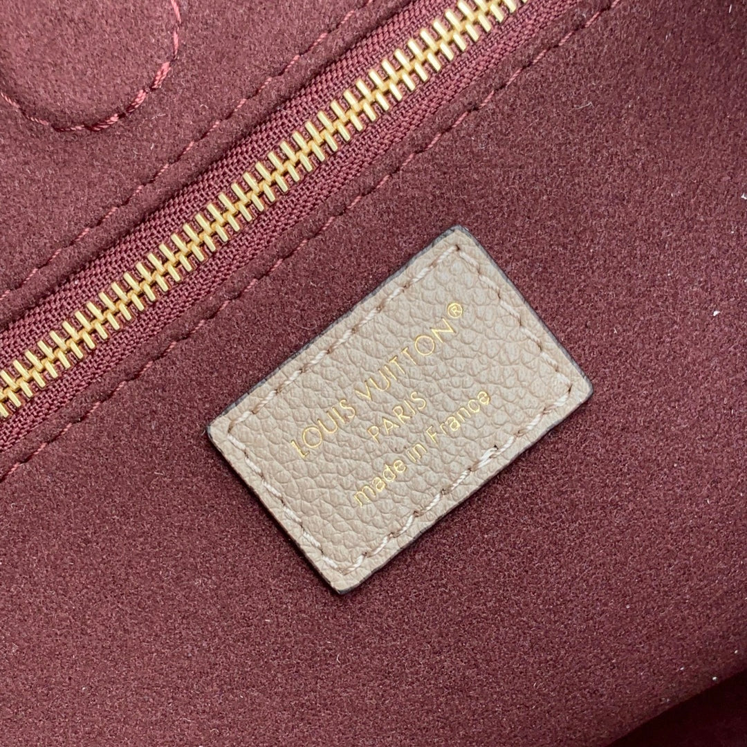 ANYTIME PM 34 IN ASH BROWN MONOGRAM EMPREINTE CALFSKIN