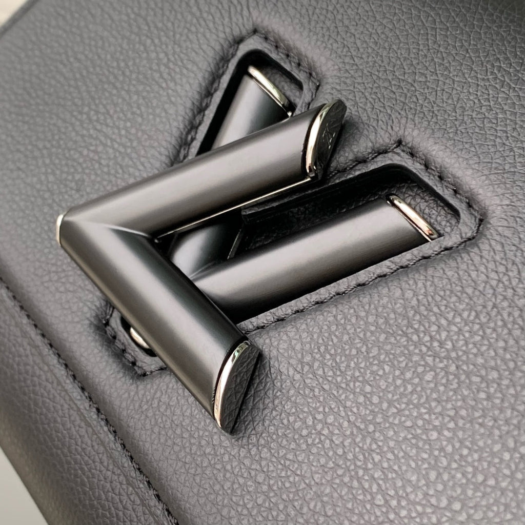 TWIST SLIM 19 IN BLACK TAURILLON CALFSKIN WITH PEARL CHAIN