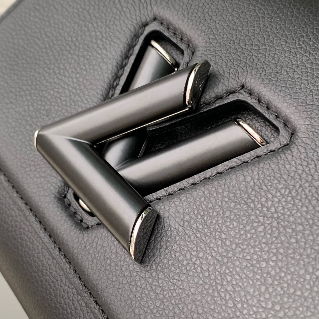 TWIST SLIM 19 IN BLACK TAURILLON CALFSKIN WITH PEARL CHAIN