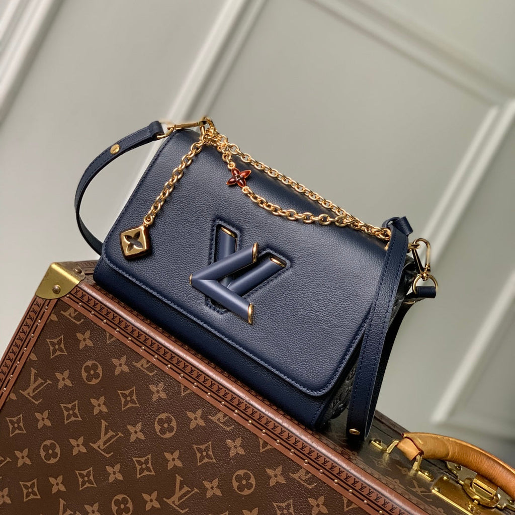 TWIST SLIM 19 IN NAVY BLUE TAURILLON CALFSKIN GOLD HARDWARE