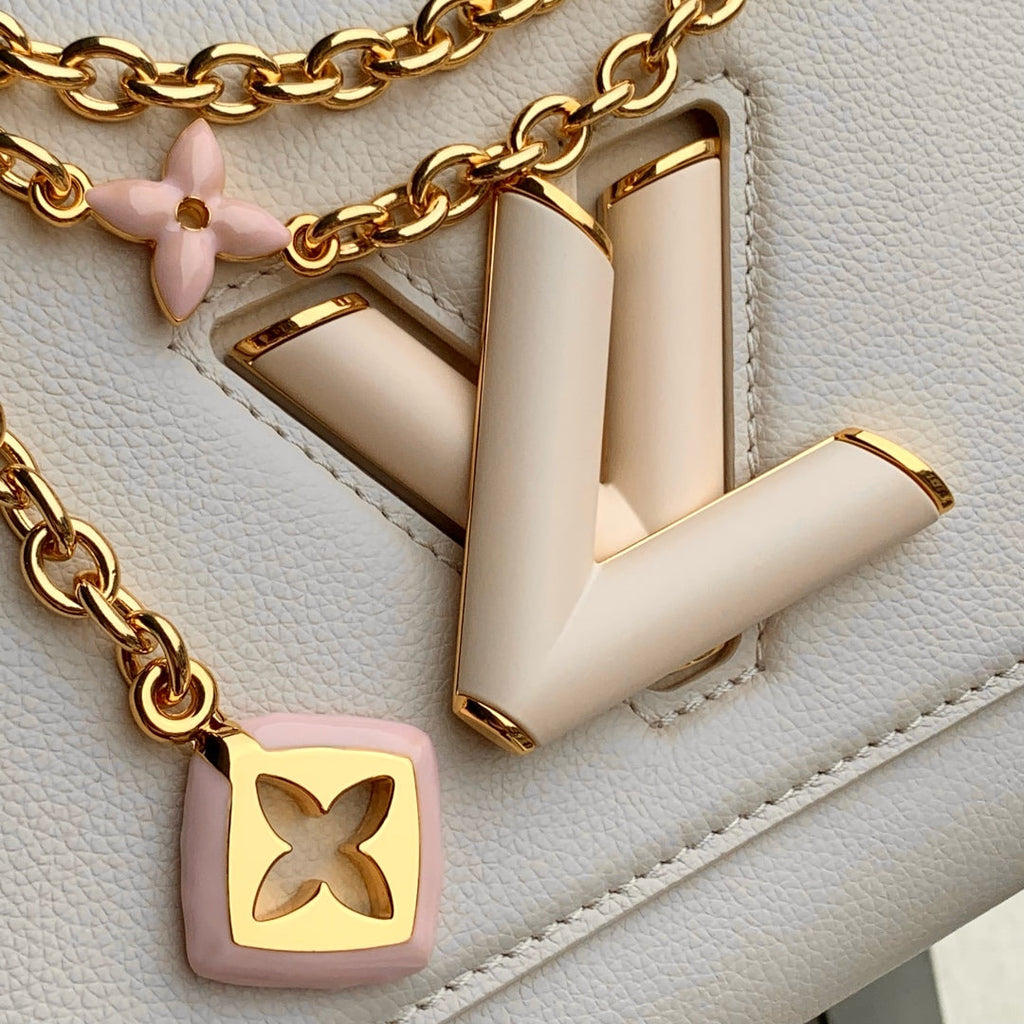 TWIST SLIM 19 IN LIGHT PINK TAURILLON CALFSKIN GOLD HARDWARE