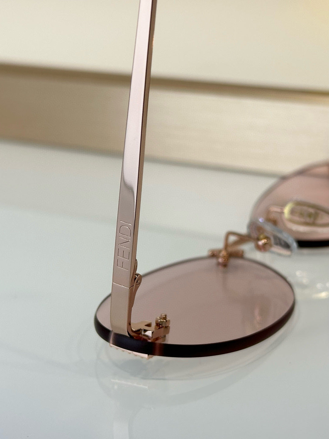 FIRST CRYSTAL RIMLESS OVAL FRAME SUNGLASSES FE4075US IN METAL