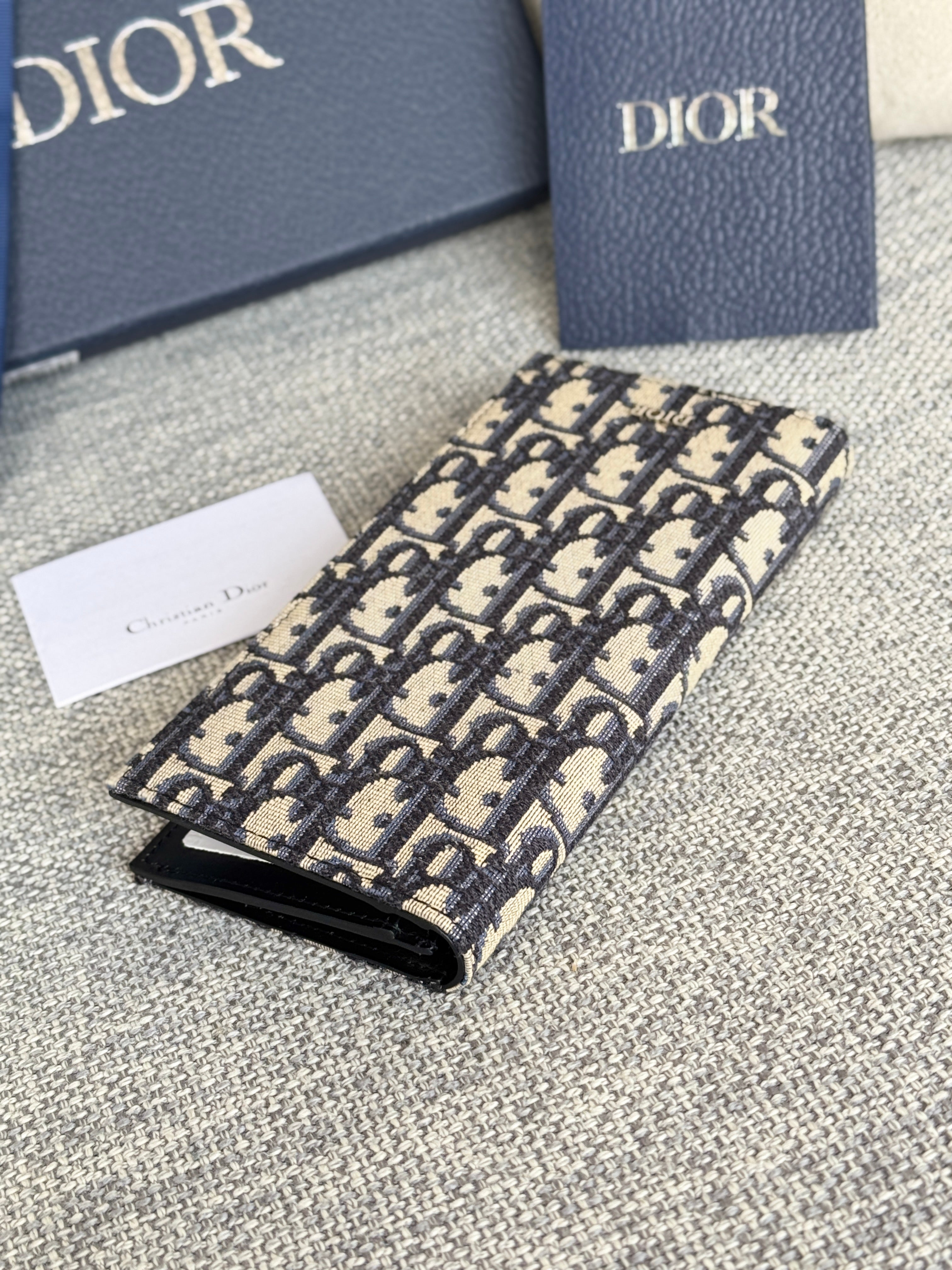 VERTICAL LONG WALLET 19 IN BLUE MONOGRAM OBLIQUE JACQUARD