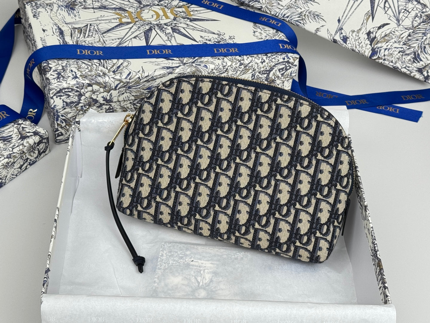 DIOR 25S 30 MONTAIGNE CLUTCH BAG 24 IN BLUE DIOR OBLIQUE JACQUARD
