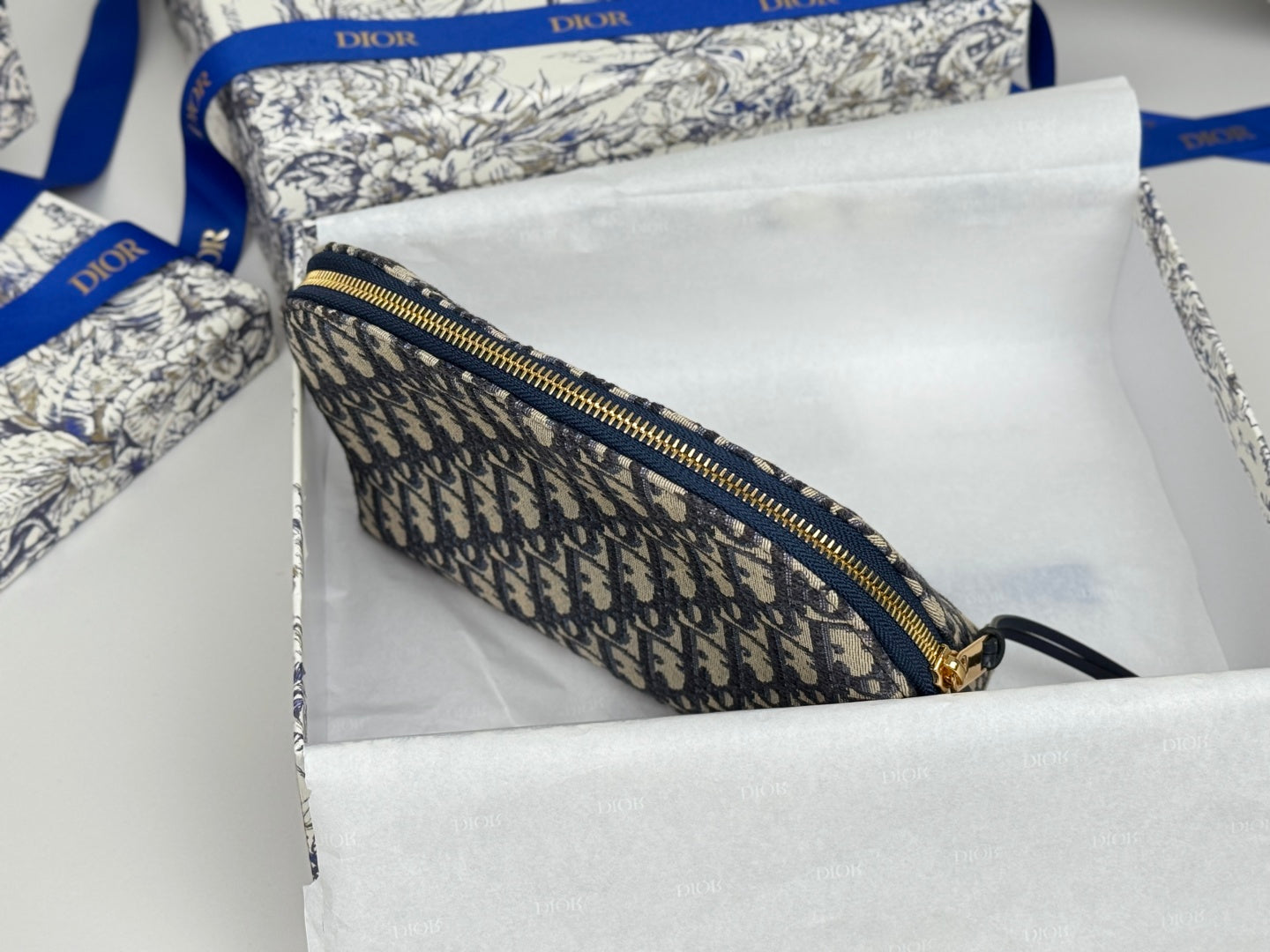 DIOR 25S 30 MONTAIGNE CLUTCH BAG 24 IN BLUE DIOR OBLIQUE JACQUARD