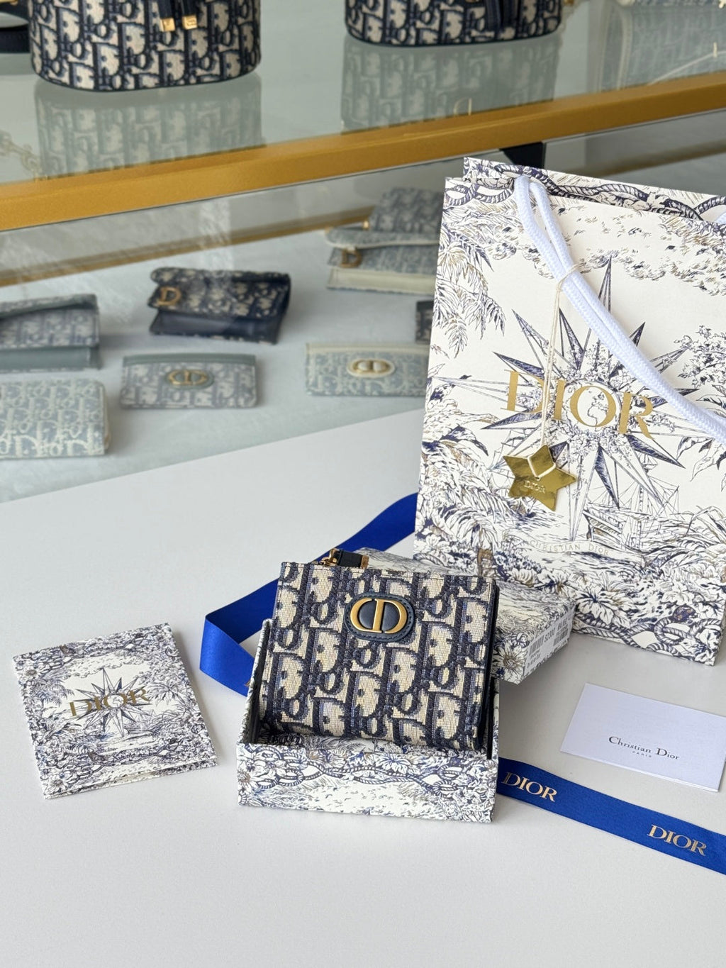 DIOR 25S 30 MONTAIGNE DAHLIA WALLET 11 IN BLUE DIOR OBLIQUE JACQUARD