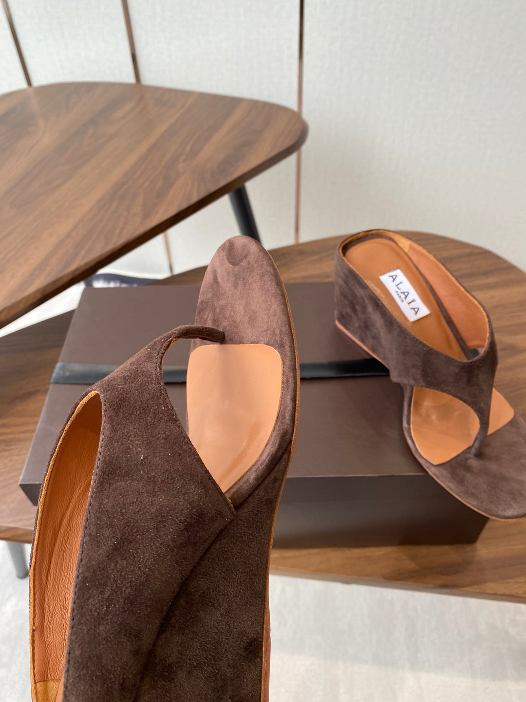 ALAIA WEDGE THONG SANDALS 25S IN BROWN SUEDE