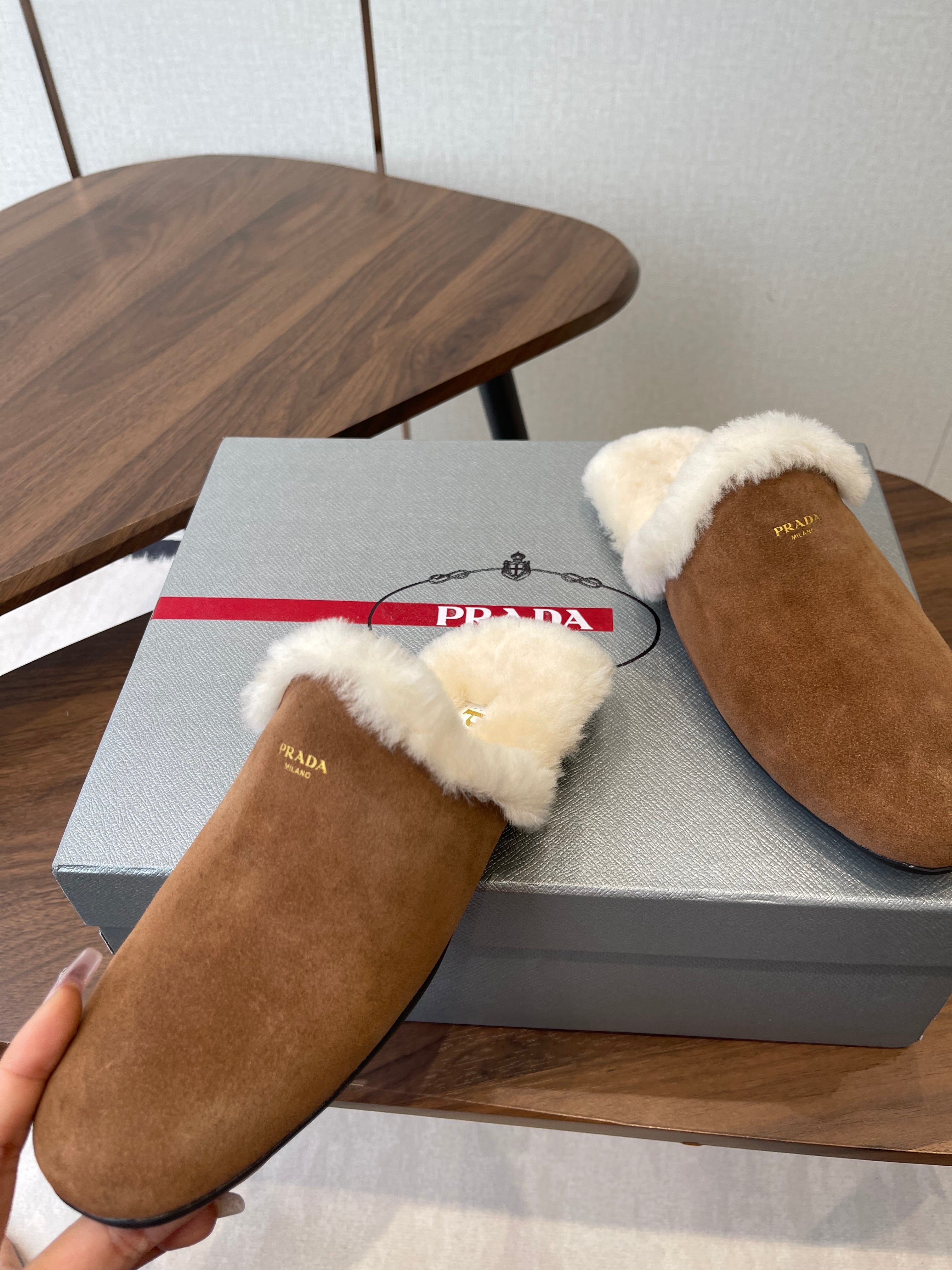 PRADA 25S CLOGS IN BROWN SUEDE FUR-LINED