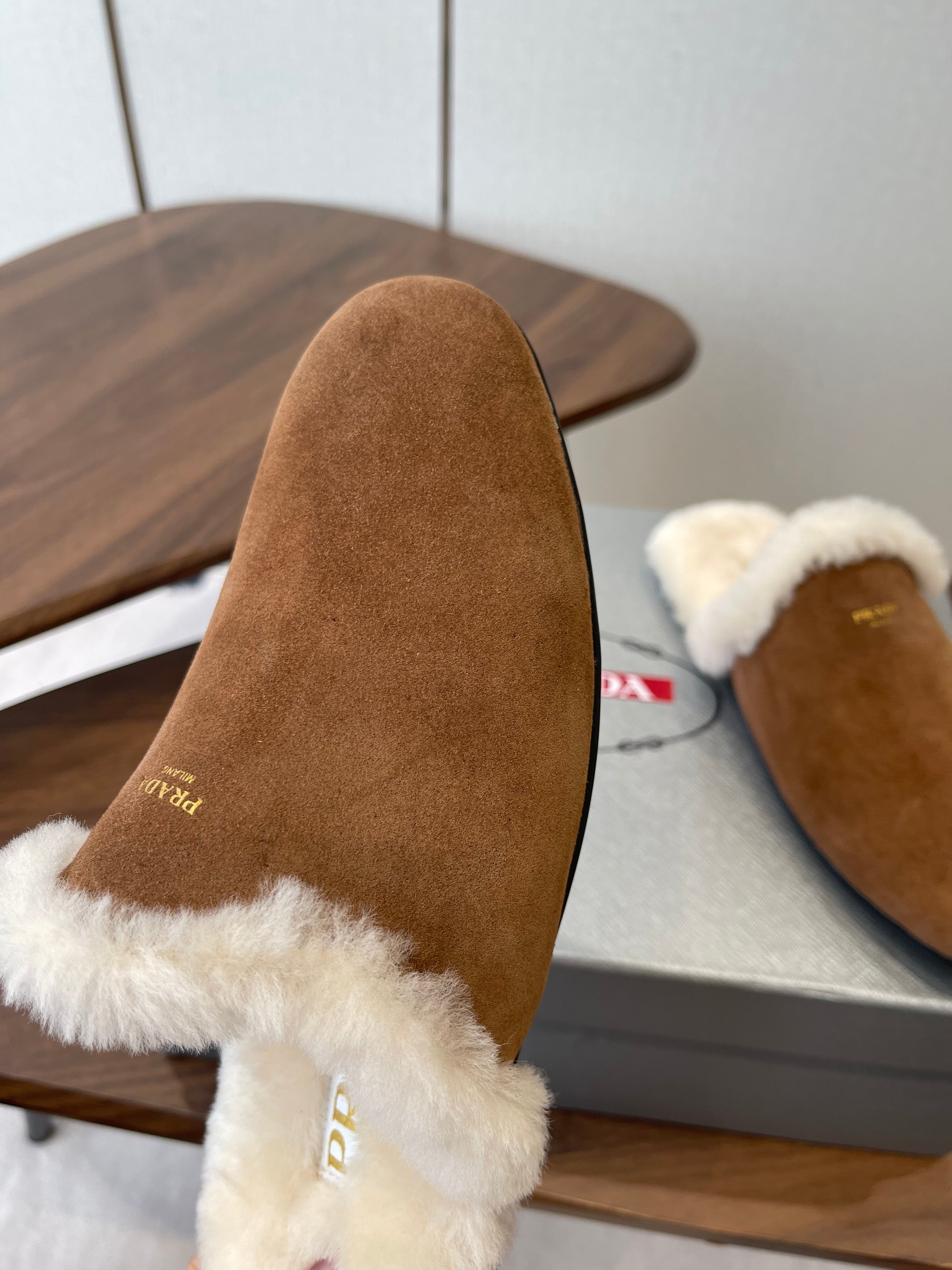 PRADA 25S CLOGS IN BROWN SUEDE FUR-LINED