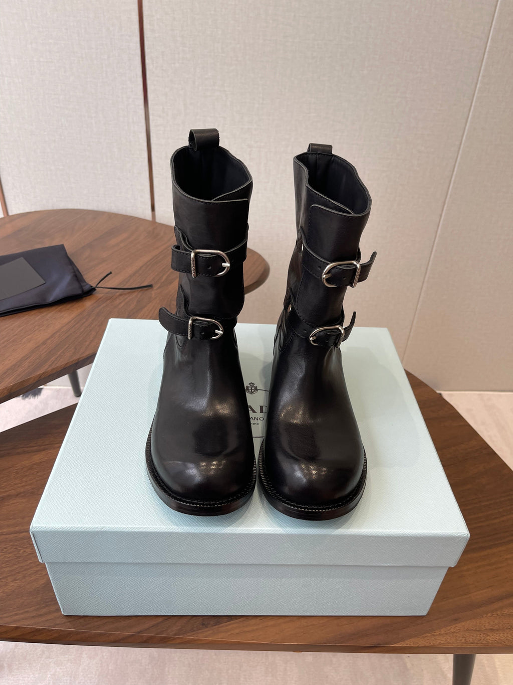 PRADA 25S TWO-BUTTON COWBOY BOOTS IN BLACK CALFSKIN WITH SILVER HARDWARE