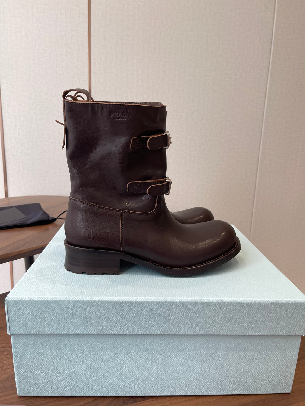 PRADA 25S TWO-BUTTON COWBOY BOOTS IN DARK BROWN CALFSKIN WITH SILVER HARDWARE