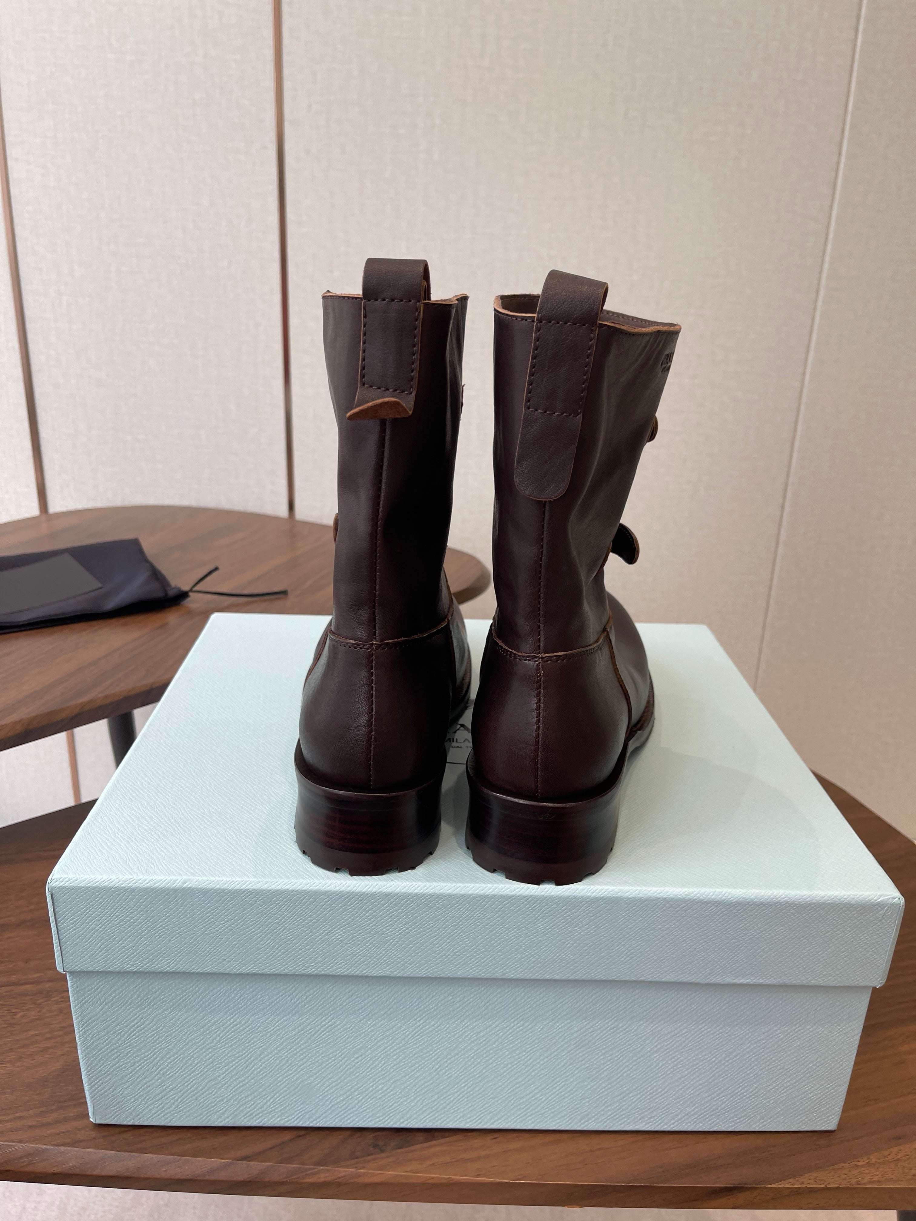 PRADA 25S TWO-BUTTON COWBOY BOOTS IN DARK BROWN CALFSKIN WITH SILVER HARDWARE