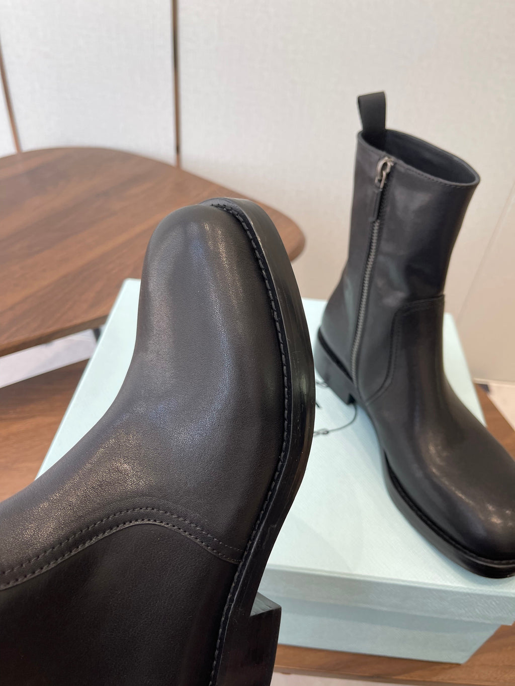 PRADA 25S COWBOY BOOTS IN DARK BLACK-BROWN CALFSKIN