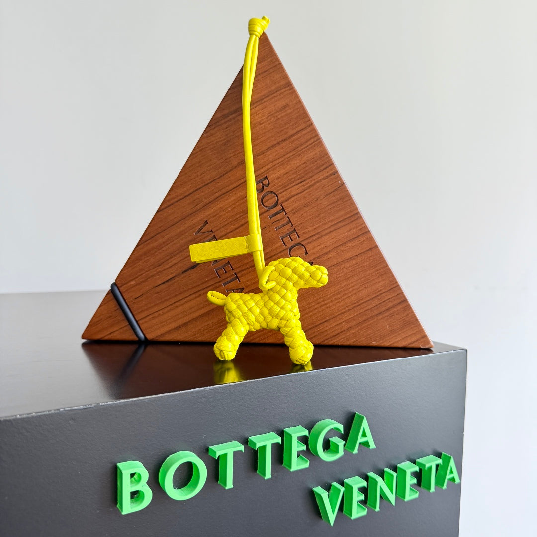 BOTTEGA VENETA 25S DOG CHARM IN LEMON YELLOW CALFSKIN
