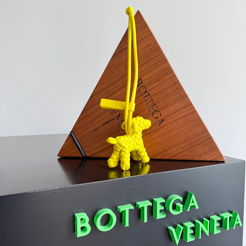 BOTTEGA VENETA 25S DOG CHARM IN LEMON YELLOW CALFSKIN