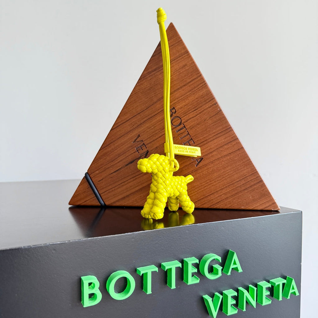 BOTTEGA VENETA 25S DOG CHARM IN LEMON YELLOW CALFSKIN