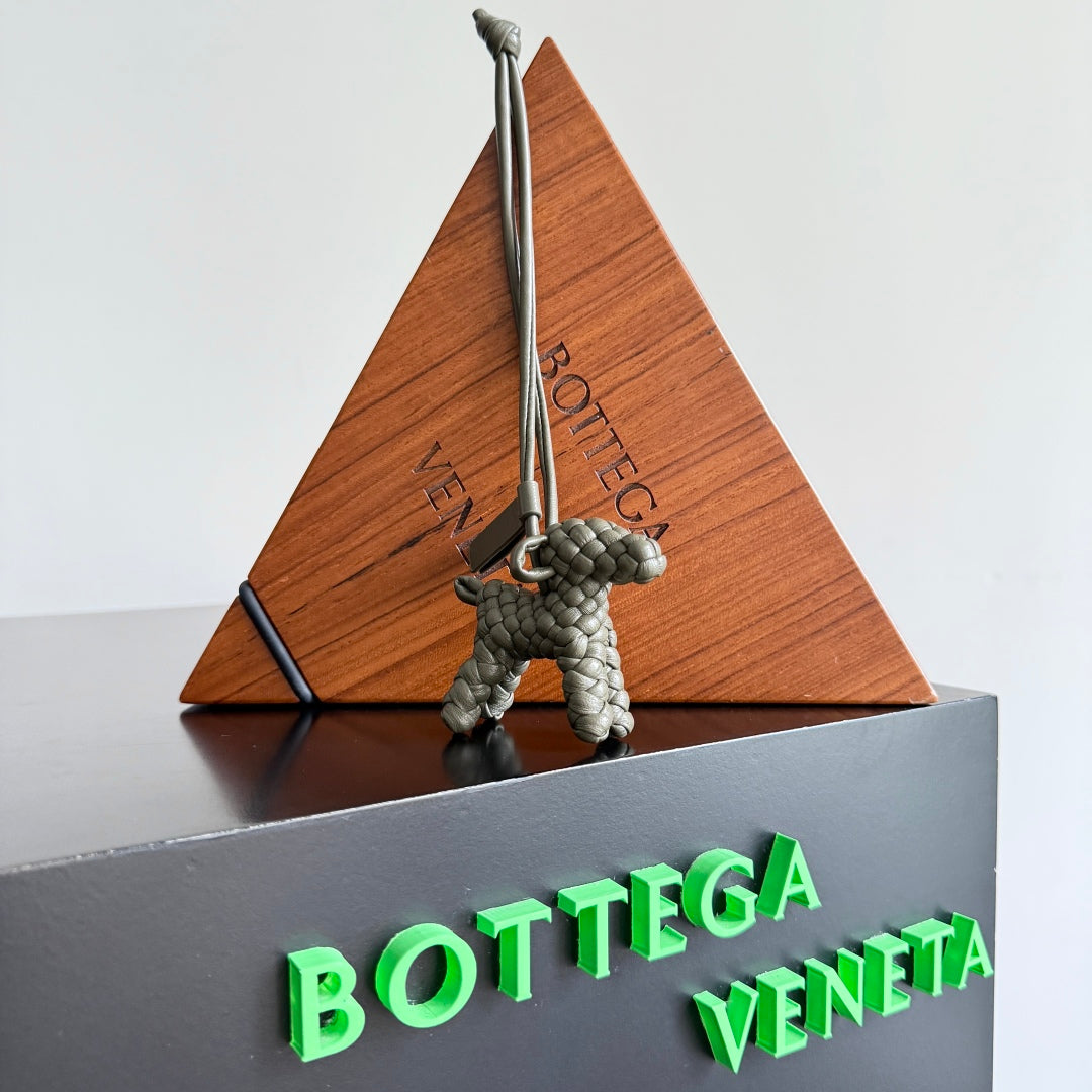 BOTTEGA VENETA 25S DOG CHARM IN GREIGE CALFSKIN
