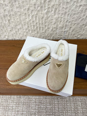 PRADA 25S PLATFORM FUR-LINED MULES IN WARM BEIGE SUEDE