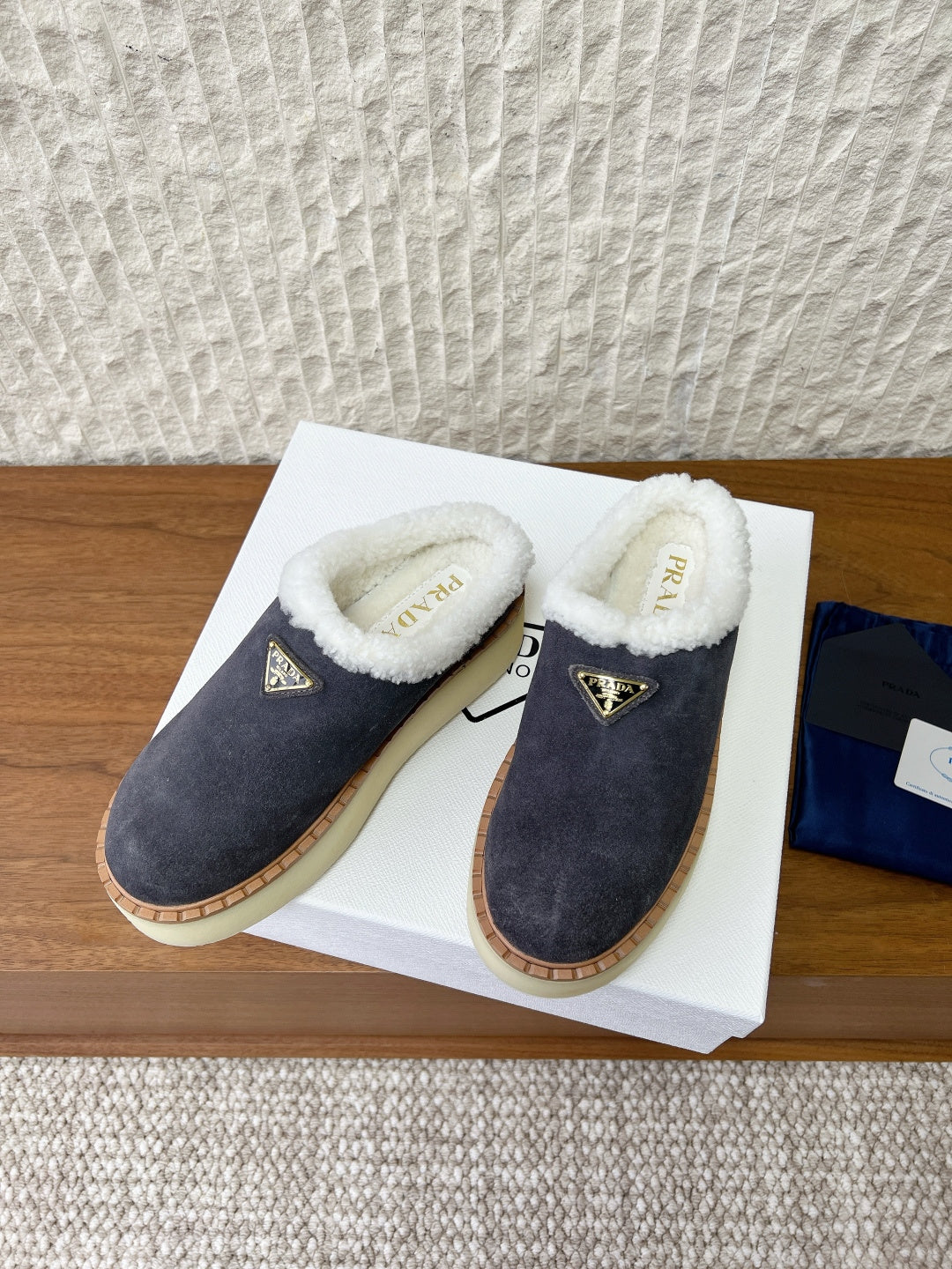 PRADA 25S PLATFORM FUR-LINED MULES IN DARK GREY SUEDE