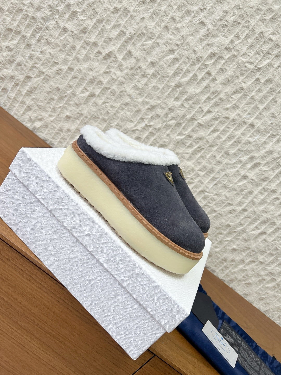 PRADA 25S PLATFORM FUR-LINED MULES IN DARK GREY SUEDE