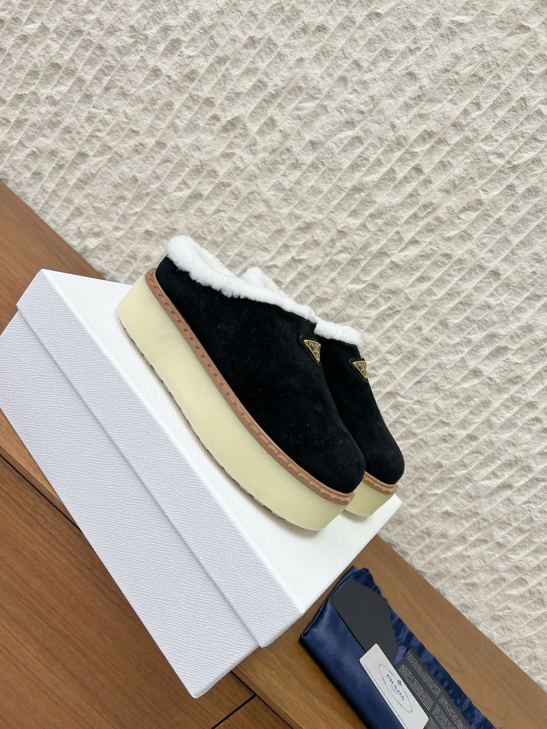 PRADA 25S PLATFORM FUR-LINED MULES IN BLACK SUEDE