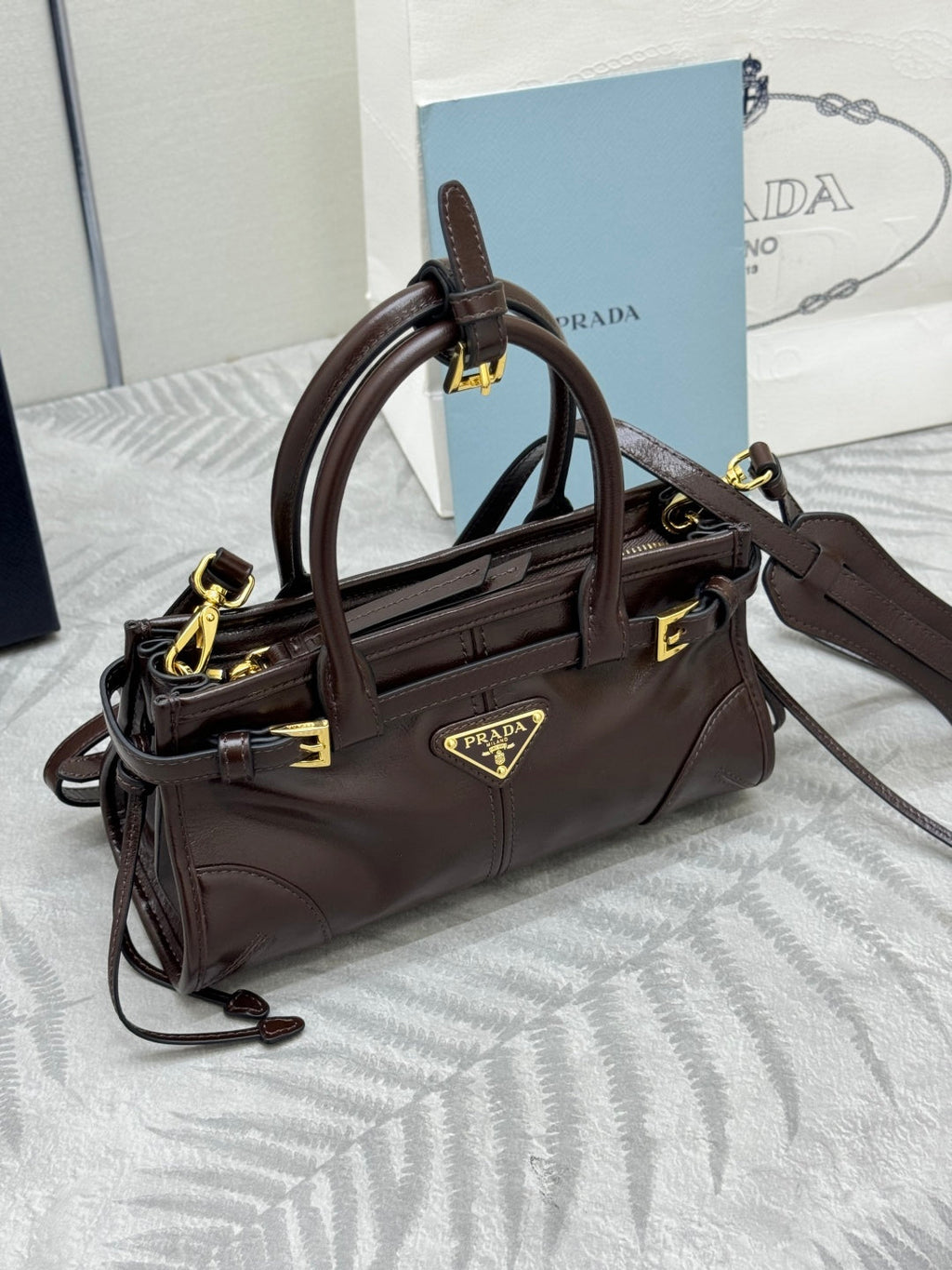 PRADA 25S BONNIE MINI HANDBAG 23 IN DARK BROWN CALFSKIN GOLD HARDWARE