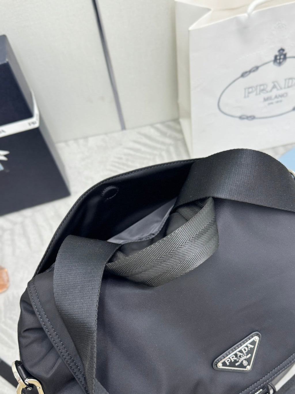 PRADA 25S EXPLORE BACKPACK 39 IN BLACK RE-NYLON AND CALFSKIN