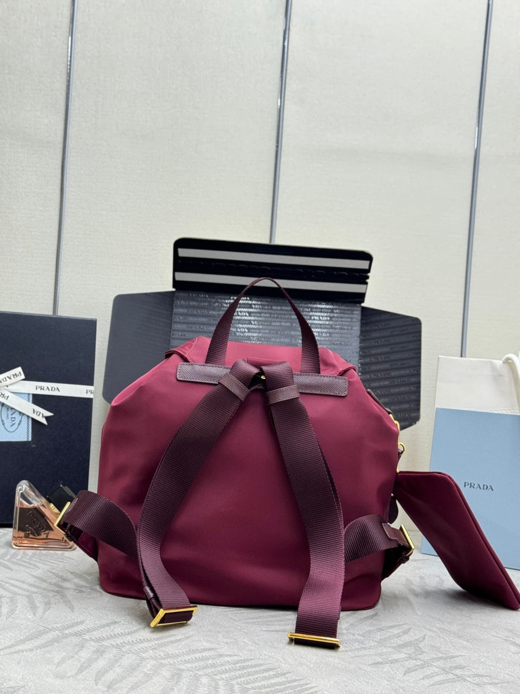 PRADA 25S RE-EDITION 1978 SMALL BACKPACK 32 IN BURGUNDY RE-NYLON