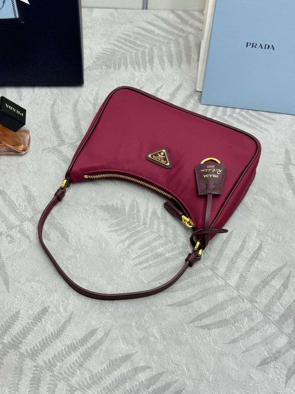 PRADA 25S RE-EDITION 2005 MINI BAG 22 IN BURGUNDY RE-NYLON AND SAFFIANO
