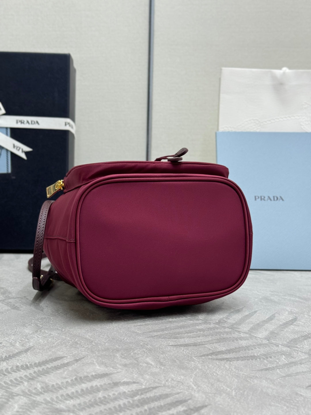 PRADA 25S DUET BUCKET BAG 23 IN BURGUNDY RE-NYLON GOLD HARDWRE