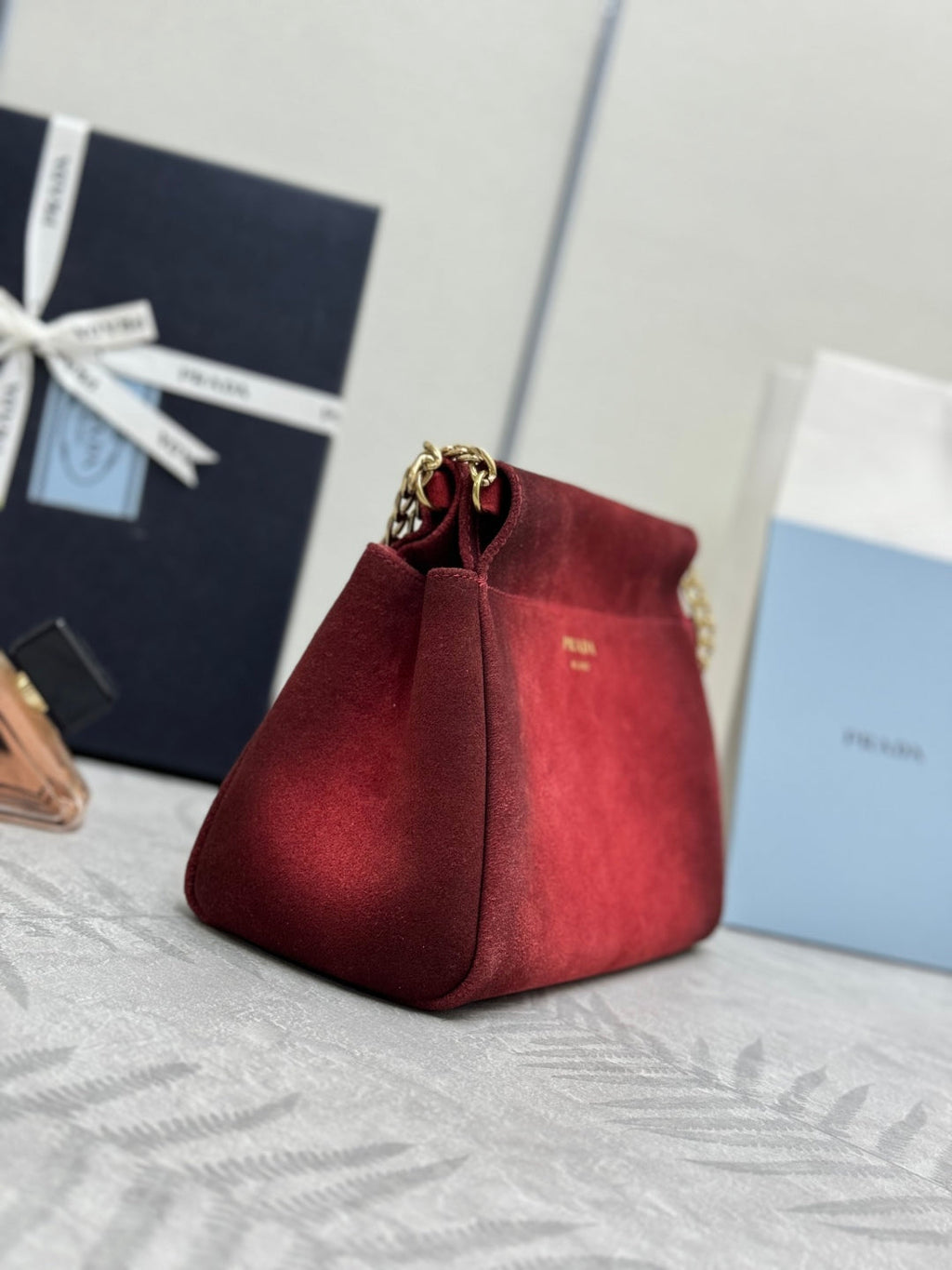 PRADA 25S ENCHAINE MINI BAG 22 IN RUBY RED SUEDE GOLD HARDWARE