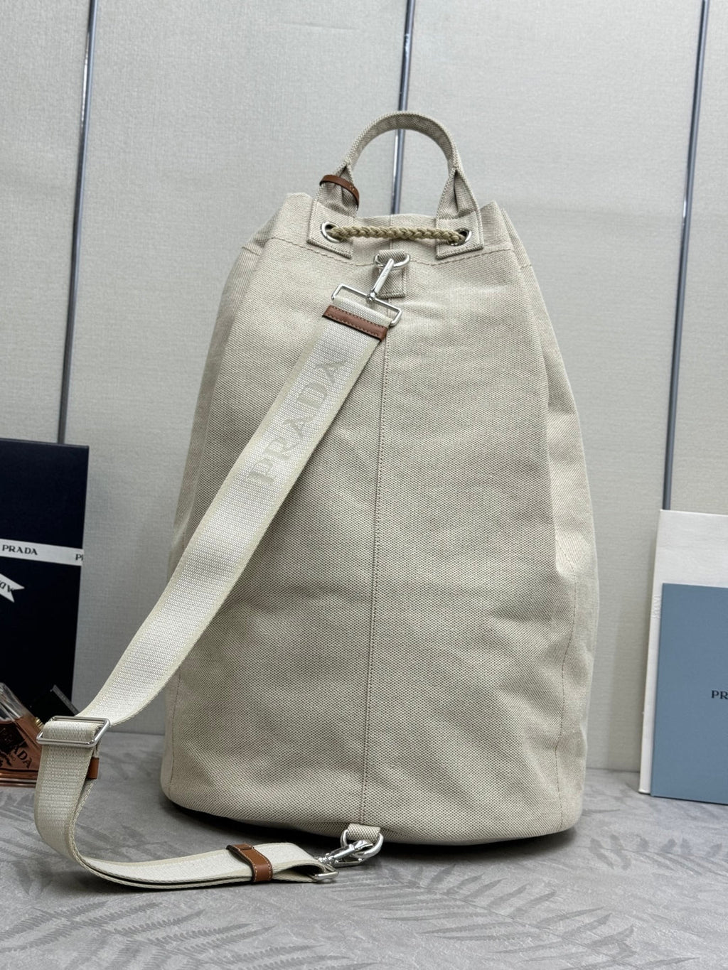 PRADA 25S DRAWSTRING BACKPACK 55 IN BEIGE CANVAS LINEN SILVER HARDWARE