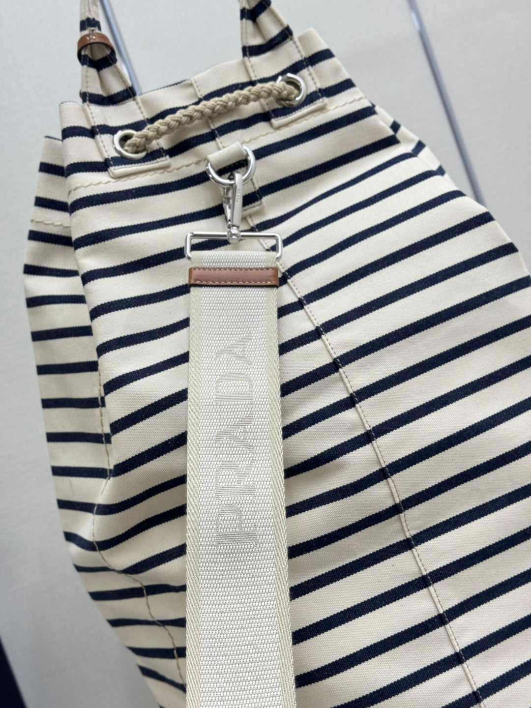 PRADA 25S DRAWSTRING BACKPACK 55 IN HORIZONTAL STRIPES CANVAS SILVER HARDWARE