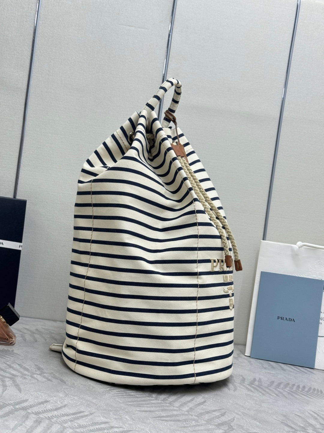 PRADA 25S DRAWSTRING BACKPACK 55 IN HORIZONTAL STRIPES CANVAS SILVER HARDWARE